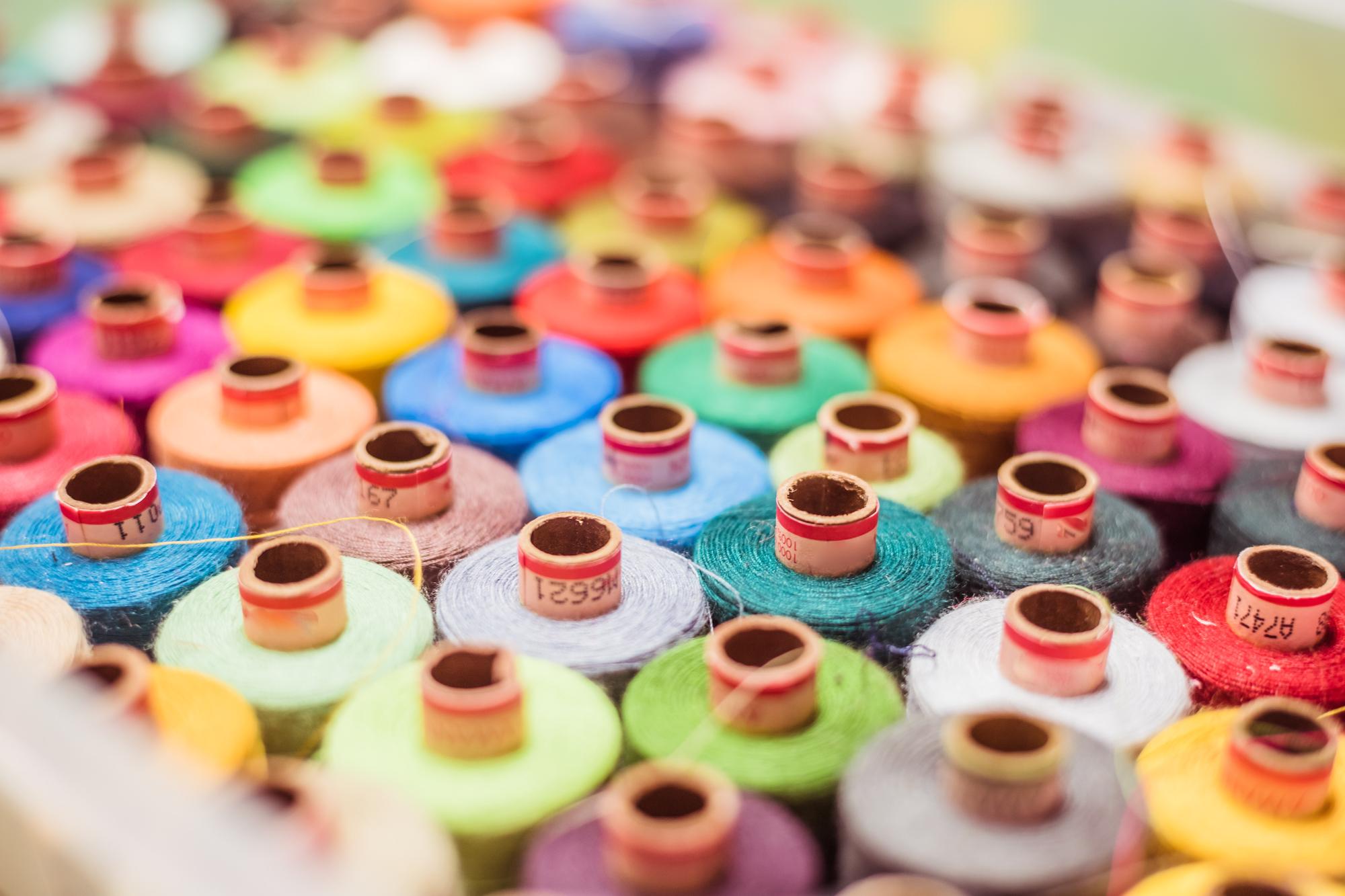 Thread spools and sample tags in a workshop